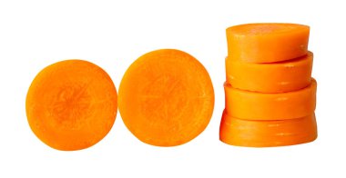 Side view of orange carrot slices in stack and set is isolated on white background with clipping path.