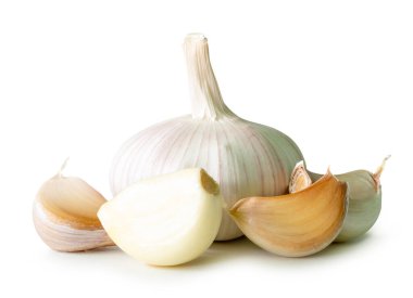 Garlic bulb with cloves in heap is isolated on white background with clipping path.