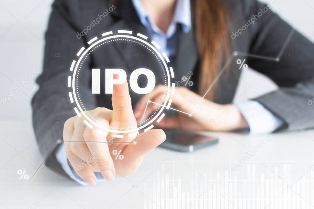 Businesswoman touch IPO icon on digital virtual trading screen. Stock market. Business finance and technology concept.