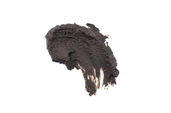 湿透的黑色化妆品粘土涂在白色背景上 黑色化妆品粘土的抽象样品 皮肤排毒用面部美容面膜 — 图库照片