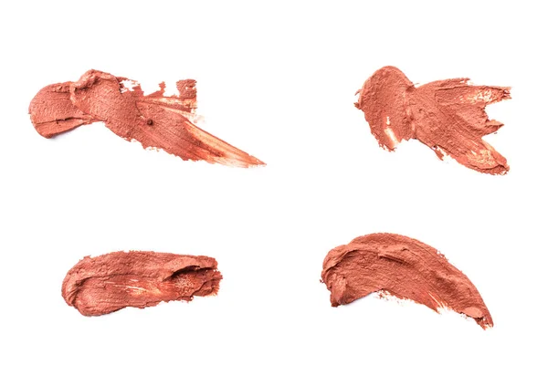 不同种类的湿红色化妆品黏土污迹分离的白色背景 粉红化妆品粘土的抽象样品 皮肤排毒用面部美容面膜 — 图库照片