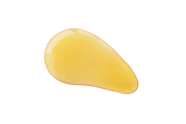 Hyaluronik asit veya serum jelinin soyut bir örneği beyaz arka planda izole edilmiş. Yüz jölesinin dokusu yakın çekim.