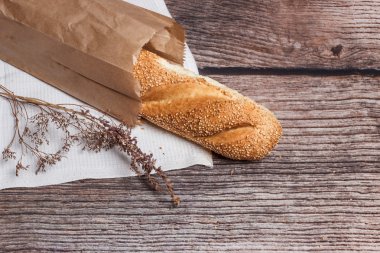 Fresh bread on a wooden surface