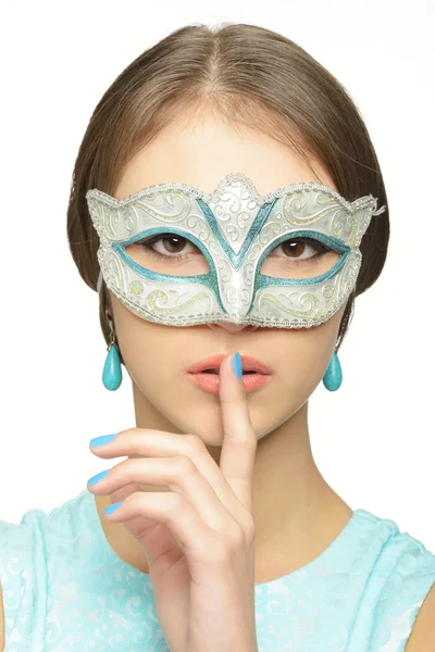 Ung pige i et karneval maske - Stock-foto
