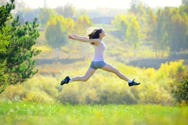 stock image Young girl jumps high