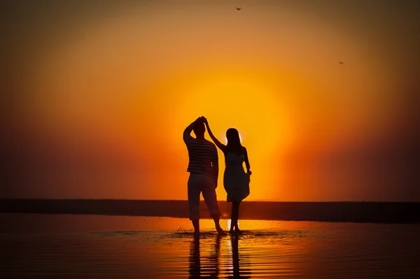 The image of two people in love at sunset — Stock Photo, Image