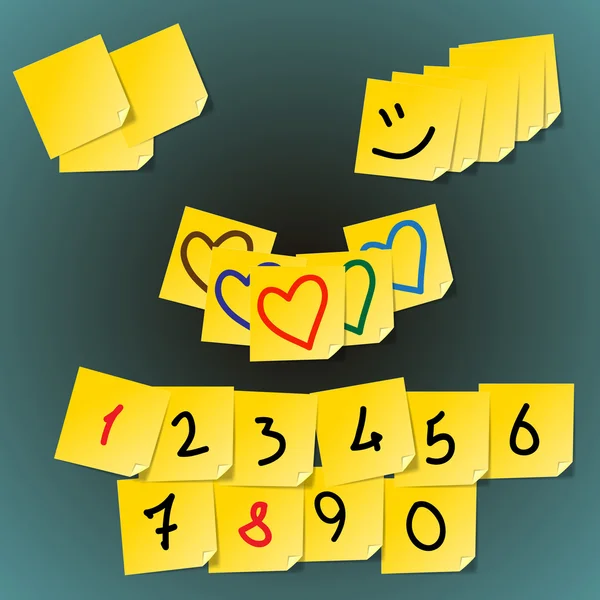 Yellow stickers stuck on a green background