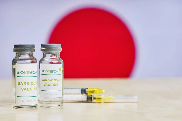 Tasjkent, Oezbekistan - 7 december 2020: massale vaccinatie in Japan met het BioNTech-vaccin — Stockfoto