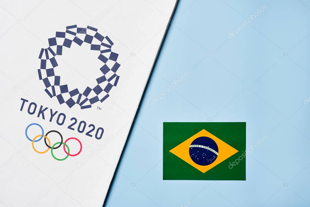 Tashkent, Uzbekistan - March 4, 2021: 2020 A towel with TOKYO 2020 Olympic games logotype and national flag of Brazil