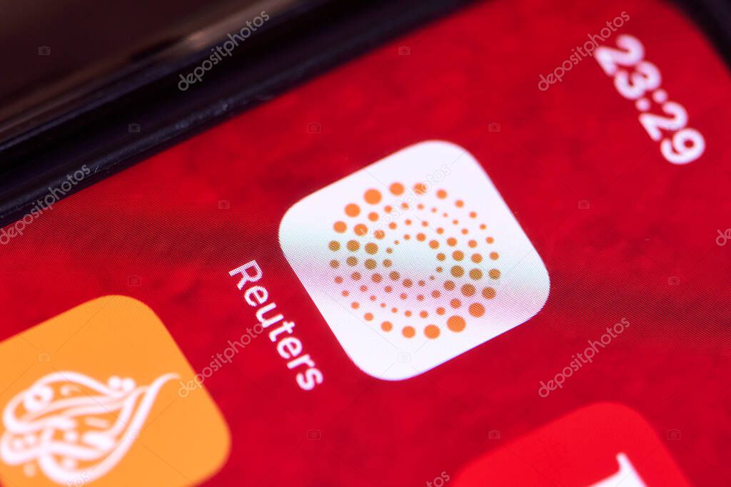 Tashkent, Uzbekistan - 15 July, 2021: Reuters mobile application on iPhone smartphone screen