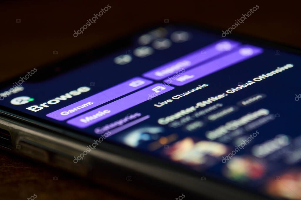 Tashkent, Uzbekistan - July 6, 2021: Twitch application on iPhone. Popular video live streaming service. Twitch - video game live streaming, broadcasts of esports competitions