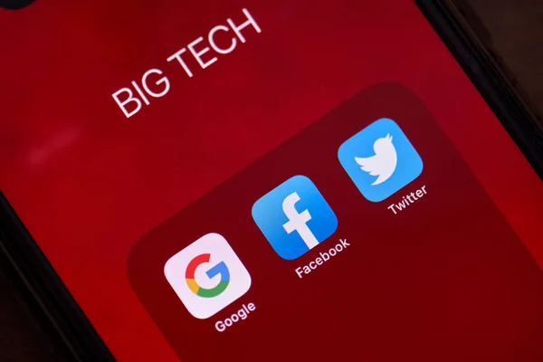 Three big tech corporations applications on smartphone screen — Stock Photo, Image
