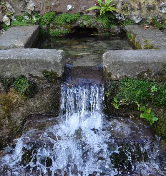 Small natural spring water fountain.