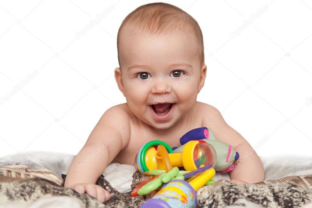 Laughing child 5 month old with toys