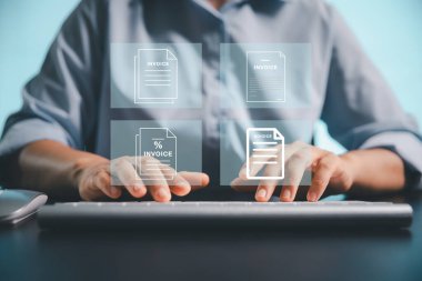 Businesswoman manages electronic statements, digital receipts on virtual screen, utilizing concept of e-invoice, digital billing, online invoice processing as smart e-tax and tax accounting solutions.