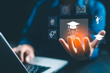 Concept of online education and digital learning is illustrated by hand using laptop, surrounded by icons such diploma, brain, target-symbolizing ideal e-learning platforms on education, development