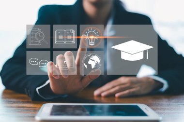 Concept of online education and digital learning is illustrated by hand using laptop, surrounded by icons such diploma, brain, target-symbolizing ideal e-learning platforms on education, development