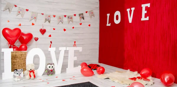 Stock image Background studio for Valentine's Day word love in red and white