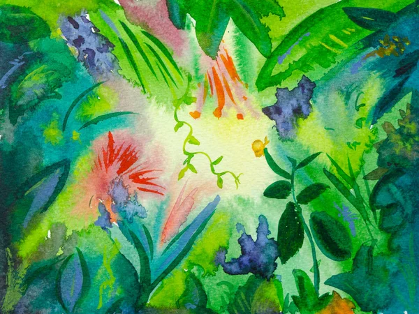 太陽の光を背景にしたジャングルの異なる緑の明るい葉と花 ストック画像