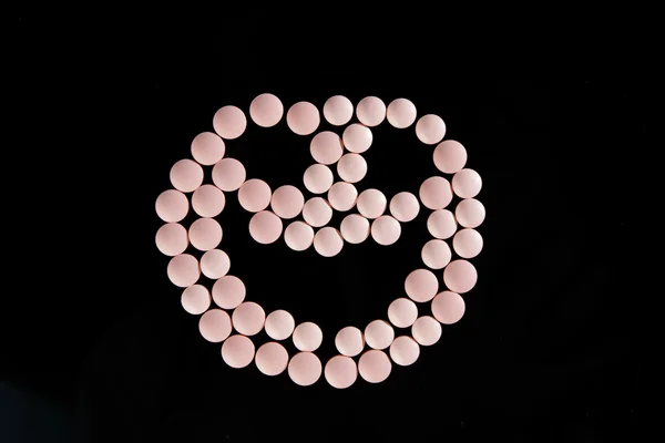 Pink pills happy face — Stock Photo, Image