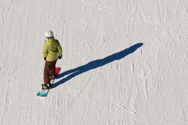 Top view of young snowboarder