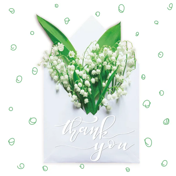 Thank You greeting card. Creative layout made with Bouquet of lilies of the valley in an envelope flowers. — Stock Photo, Image