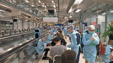 Suvarnabhumi Airport, Samut Prakan, Thailand - January 10 2021: Covid-19 Coronavirus pandemic Checkpoints immigration