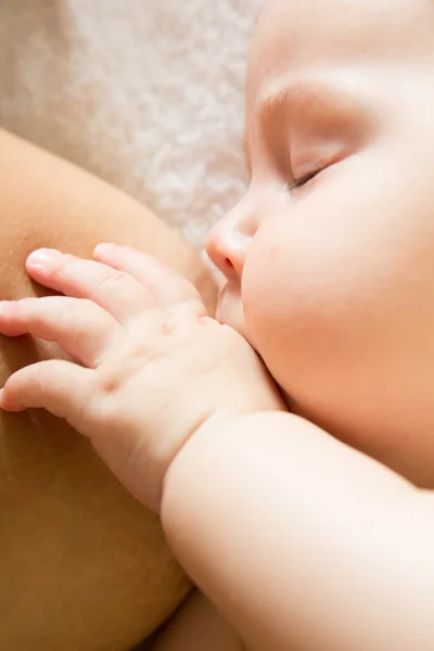 Mother is breastfeeding. Baby suckles — Stock Photo, Image