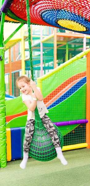 Child plays fun in the entertainment center. Game center