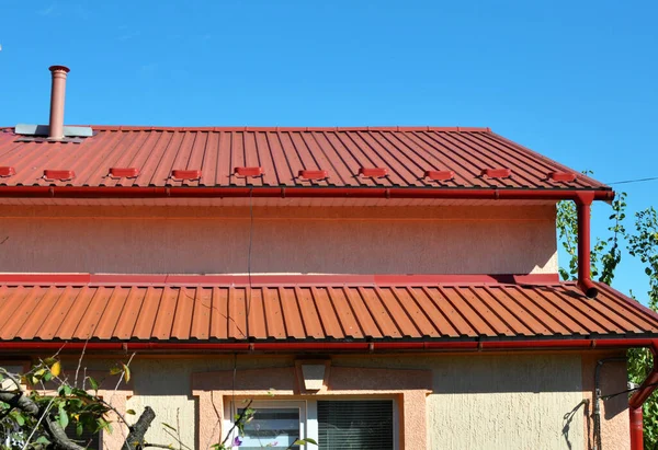 A profiled metal sheet is used to cover the roof