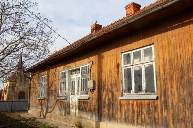 Very old rural residential house with porch