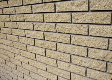 Bir tuğla duvarın dekoratif bir parçası.