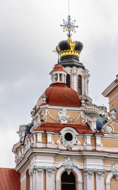 Ornate dome architecture in Vilnius Lithuania under cloudy sky