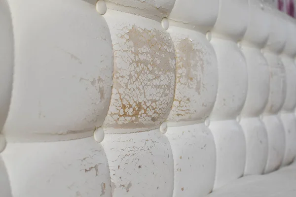 Close Damaged White Leather Soft Tufted Furniture Bed Panel Upholstery — Stock Photo, Image