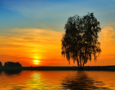  Sunset over water clipart