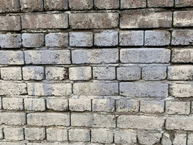 Eski bir tuğla duvarın parçası. Arkaplan olarak kullan