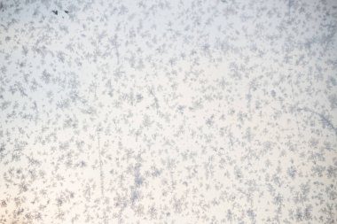 Penceredeki buzun oluşturduğu desenler