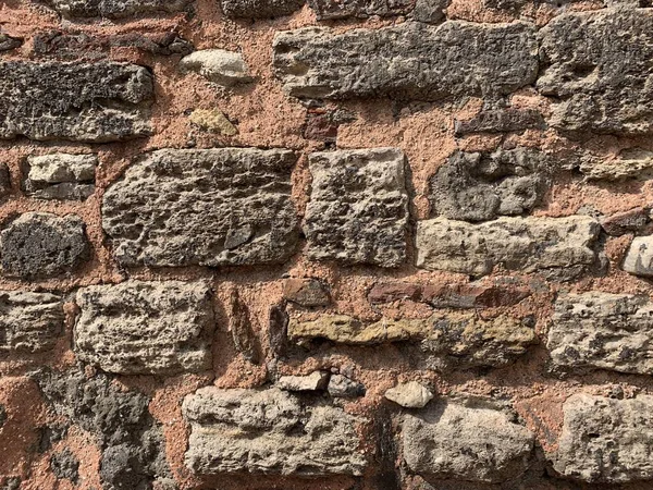 Een Deel Van Een Oude Stenen Muur Gebruik Als Achtergrond — Stockfoto