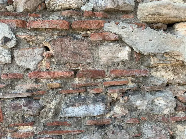 Een Deel Van Een Oude Stenen Muur Gebruik Als Achtergrond — Stockfoto