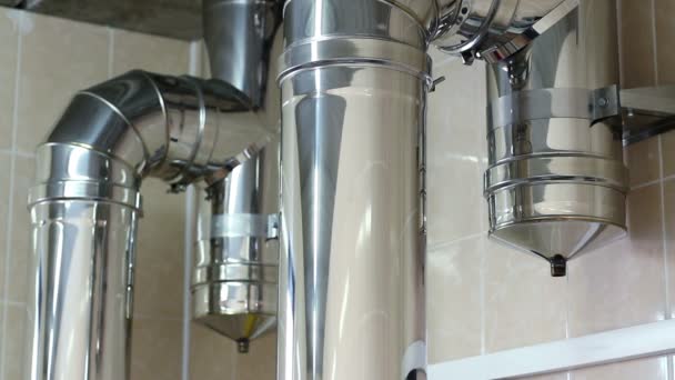 Boiler-house in private home. Heating system. Metal flues. — Stock Footage Boiler-house in private home. Heating system. Metal flues. Royalty Free Stock Video