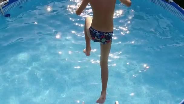 small boy swimming