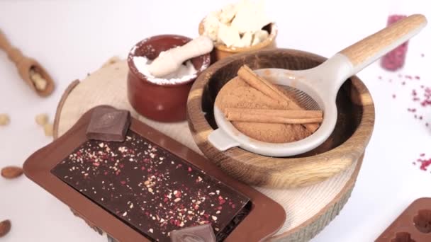 Mix of ingredients to make home chocolate bar — Stock Video