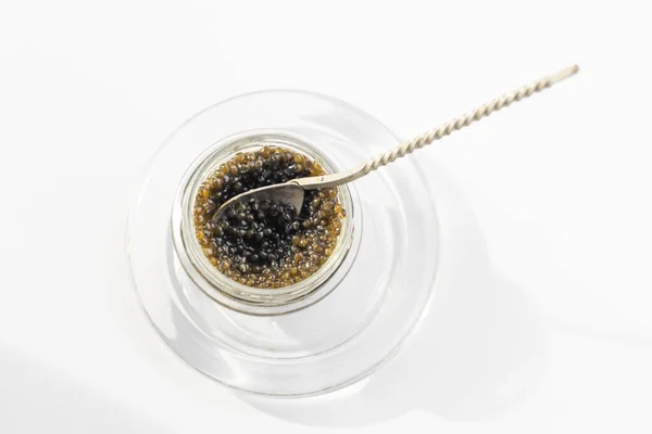 Caviar Preto Frasco Vidro Uma Colher Foco Seletivo — Fotografia de Stock