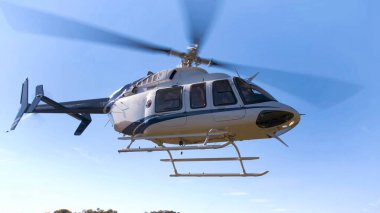 Turistleri gezmek için havalanan küçük özel bir helikopter görüntüsü