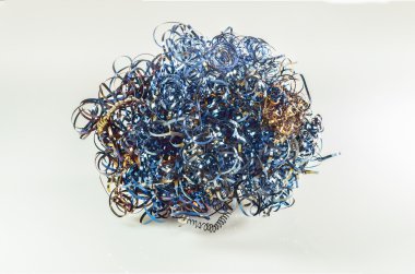 scrap metal from lathe in factory for recycle on isolated