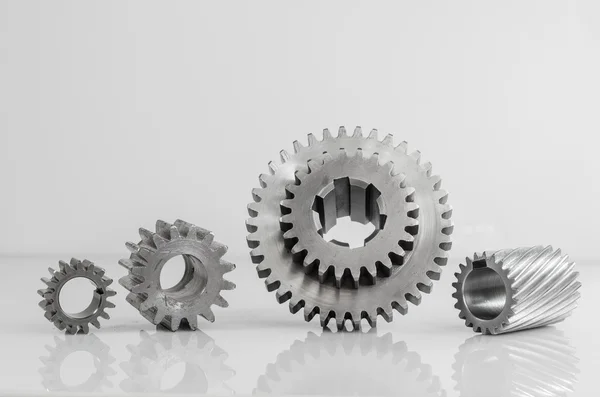 Set of gears on grey background — Stockfoto