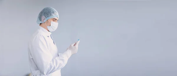 Close up of a Doctor making a vaccination in the shoulder of patient — Stock Photo, Image