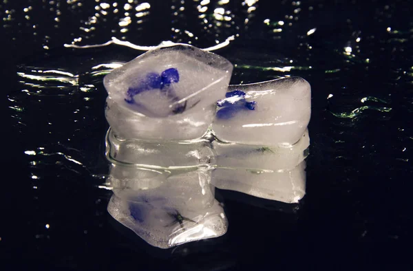 Picture for the interior. Photo for content. Pieces of ice on a dark background