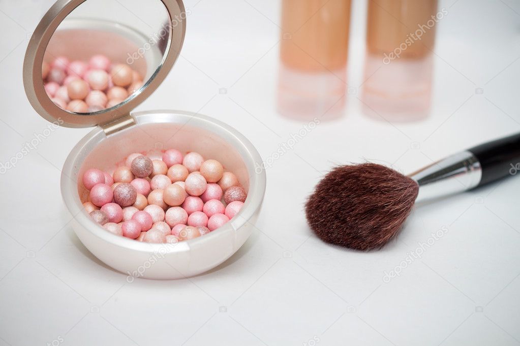 cosmetic brush and rouge  on white  background