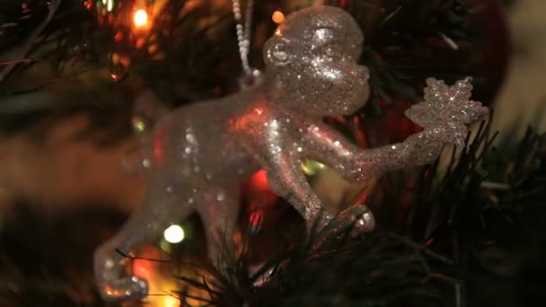 Christmas tree, a symbol of the new year 2016 a toy monkey — Stock Video